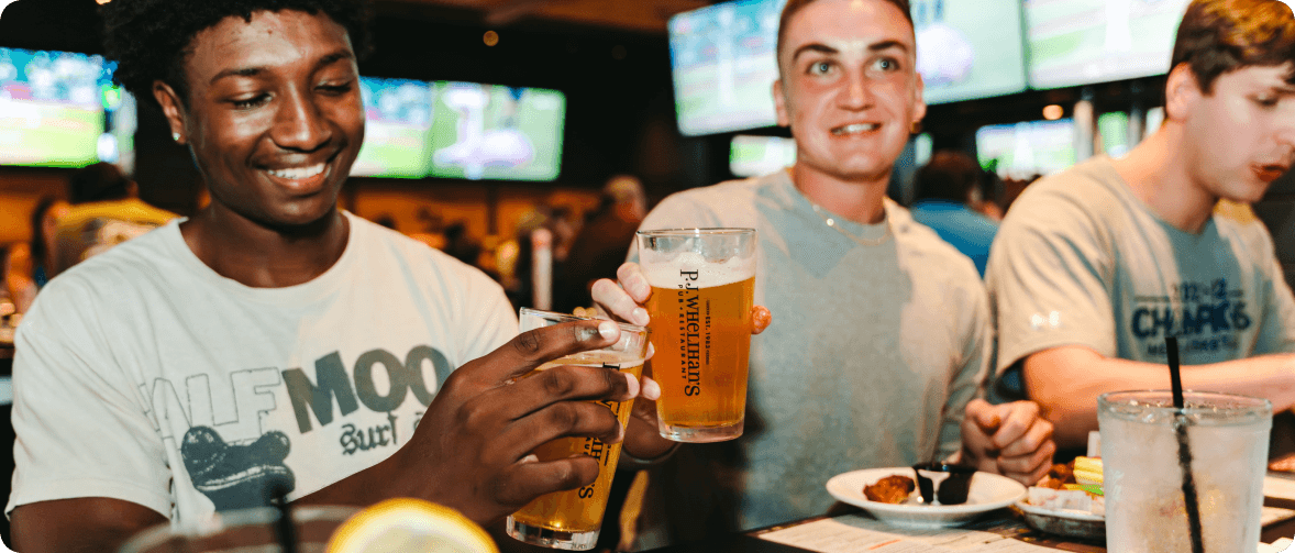 people having drinks at bar