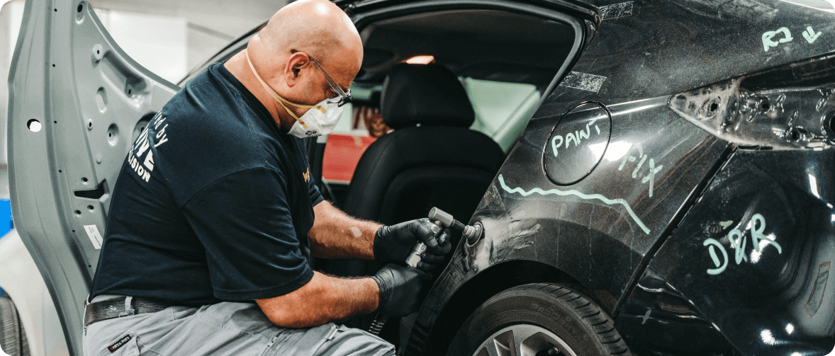 technician working on car